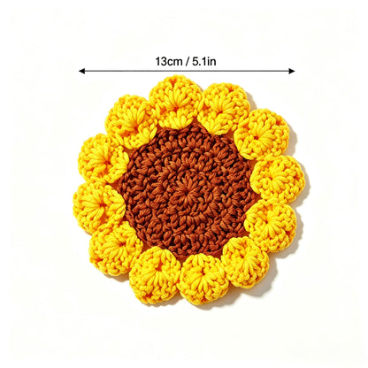 Handmade crochet sunflower coaster with brown center and yellow 3D petals, size marked 13cm 5.1 inches, top view on white background, floral drink mat
