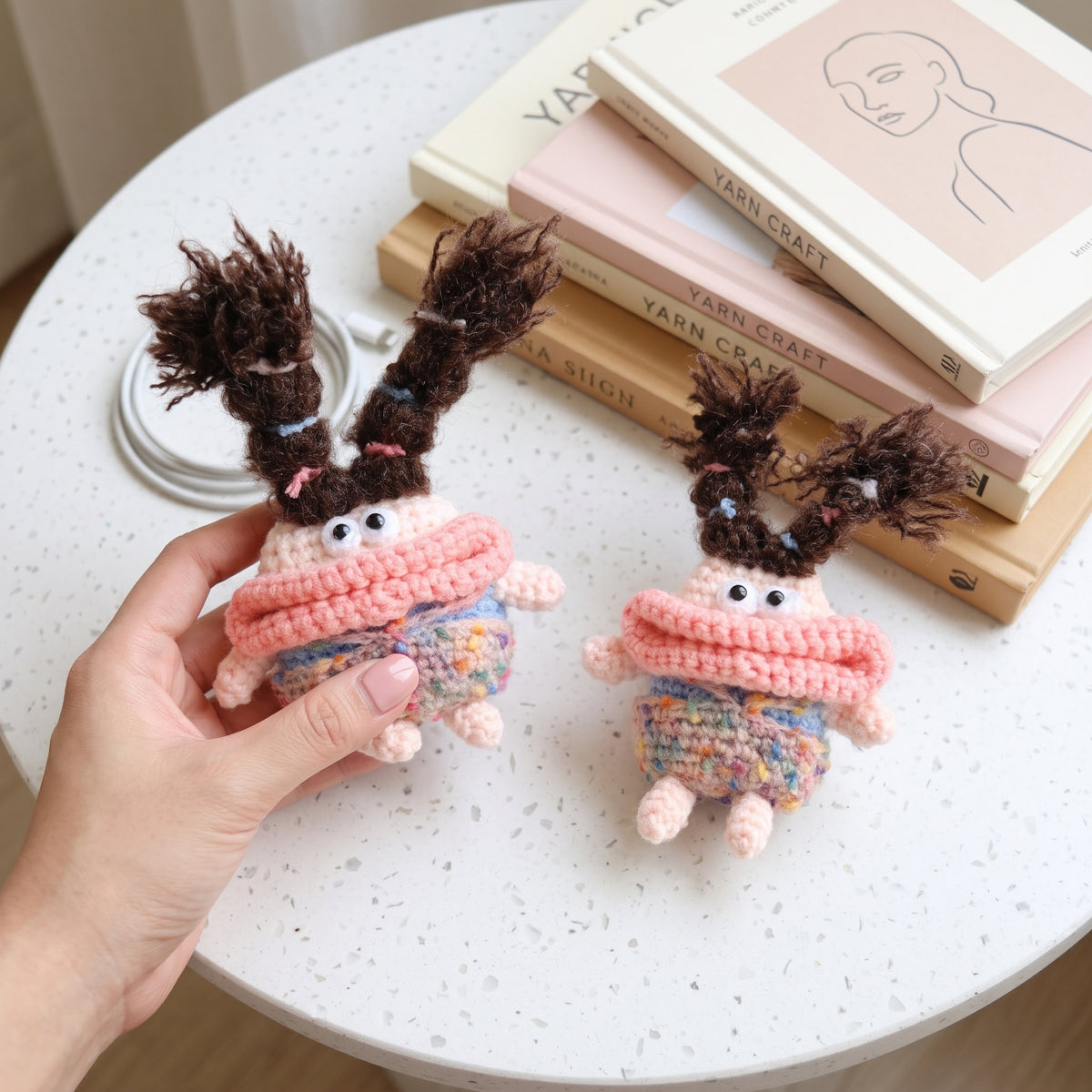 Cute crochet monster AirPods case handmade with colorful yarn and a playful character design